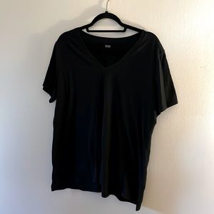 a.n.a. Black t-shirt. Stretchy material. Light slits on the side.